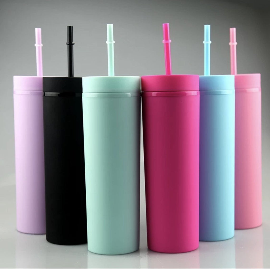 collection of coloured tumblers with straws