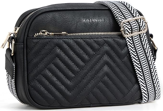 Black quilted crossbody bag with a patterned strap on a white background
