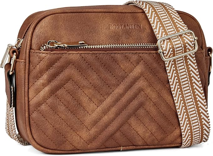 Brown quilted handbag with a patterned strap on a white background