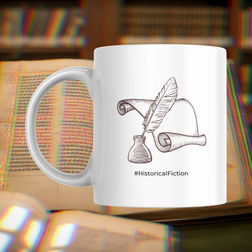 White mug with a feather and scroll design on a book background