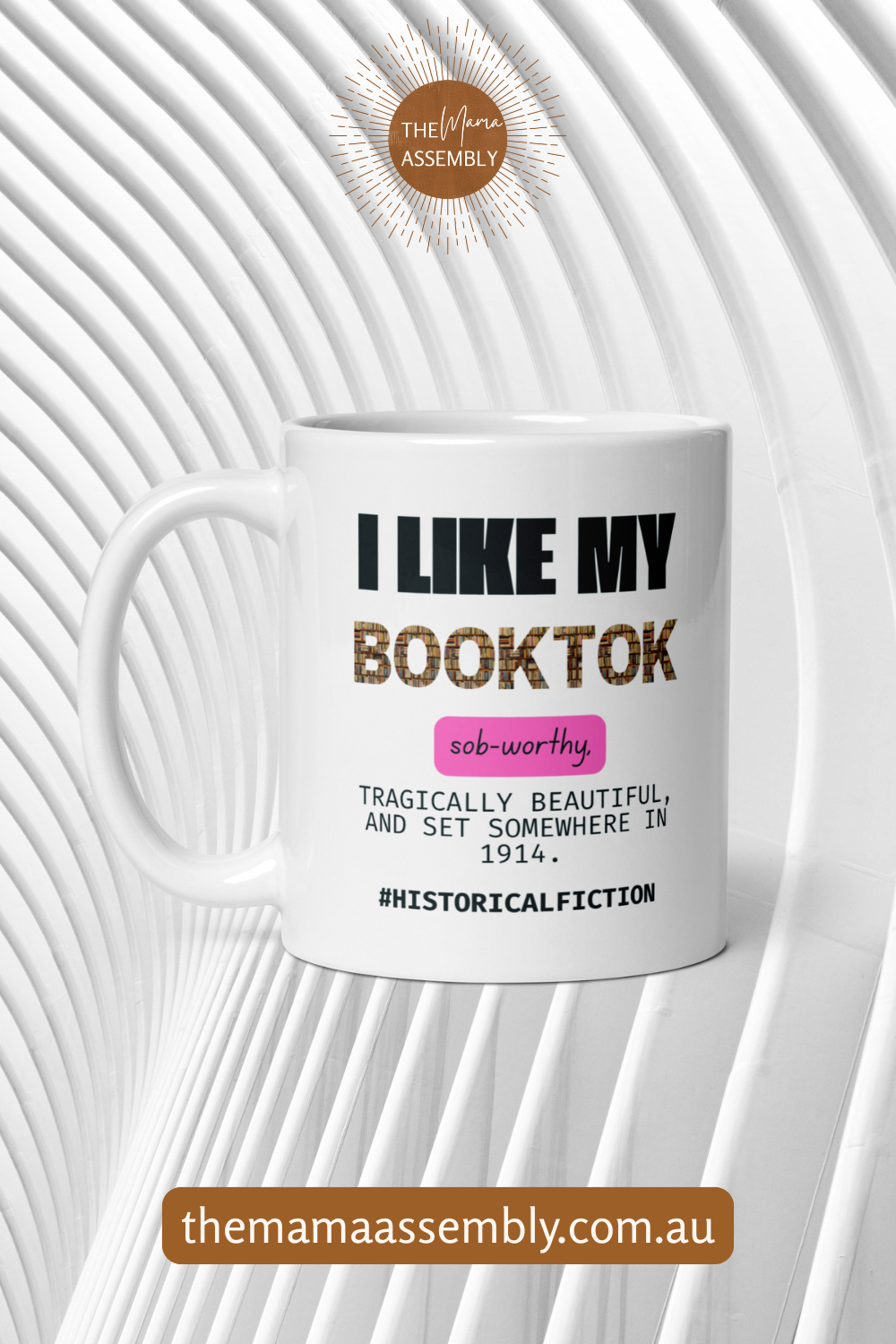 White mug with text 'I LIKE MY BOOKTOK' on a white background