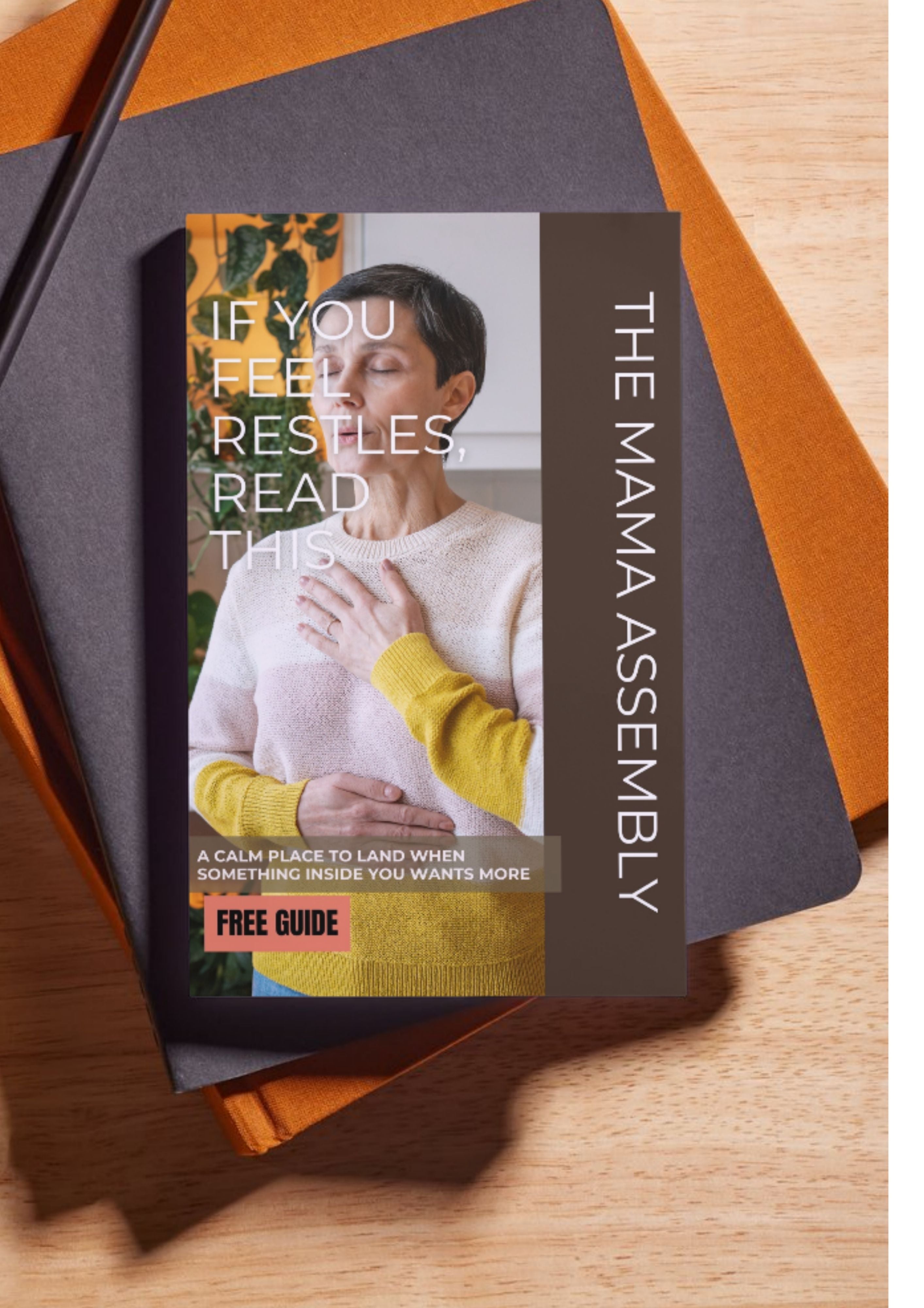 Booklet titled 'If You Feel Restless Read This' from The Mama Assembly on a wooden surface.