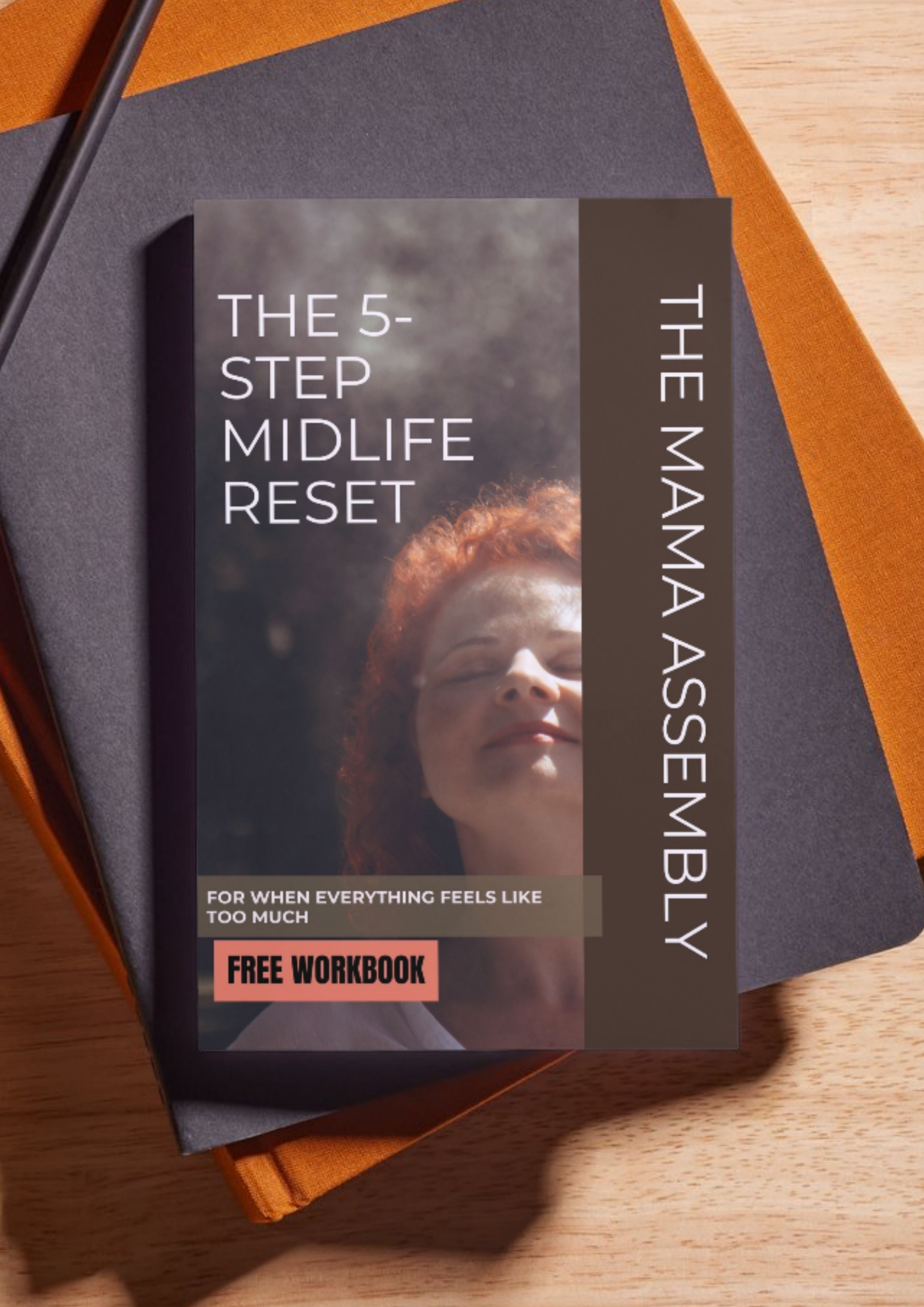 Book titled 'The 5-Step Midlife Reset' by The Mama Assembly on a wooden surface.