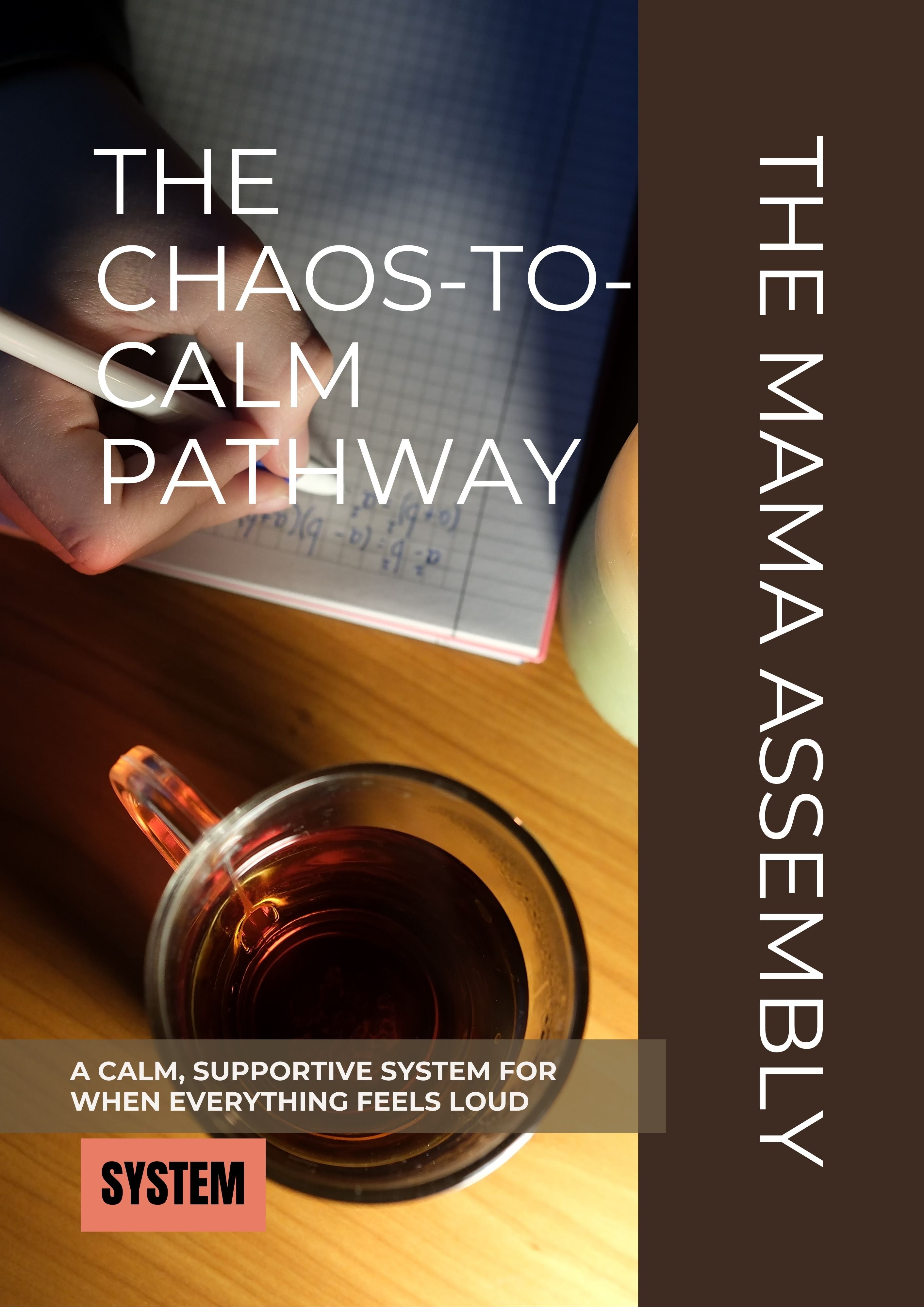 Book titled 'The Chaos-to-Calm Pathway' by The Mama Assembly with a cup of tea on a wooden table.
