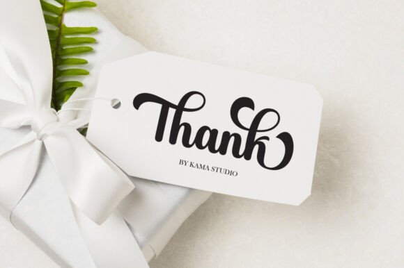 White gift with a 'Thank' tag by Kama Studio on a light background