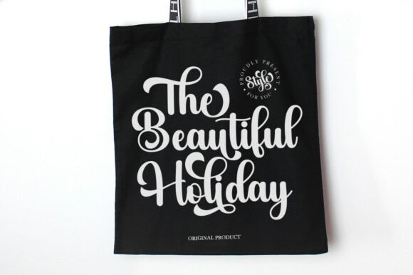 Black tote bag with white text on a white background