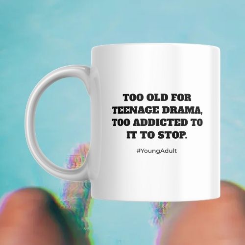 White mug with black text on a blue background Too Old for teenage drama, too addicted to stop.