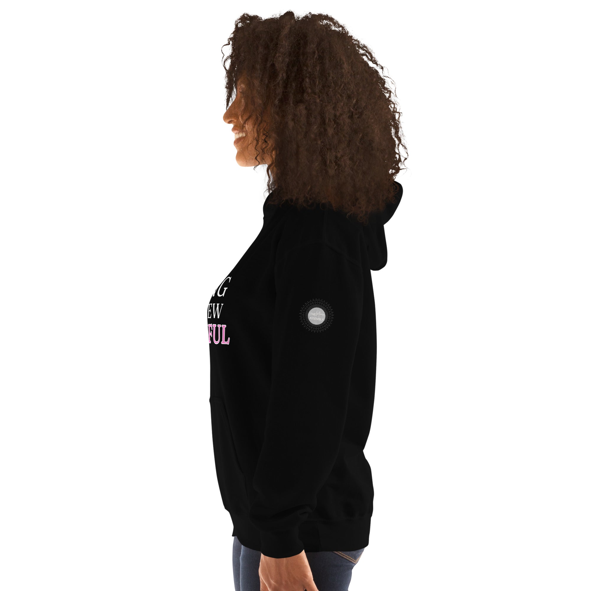 Strong is the new beautiful phrase on black hoodie logo on left sleeve