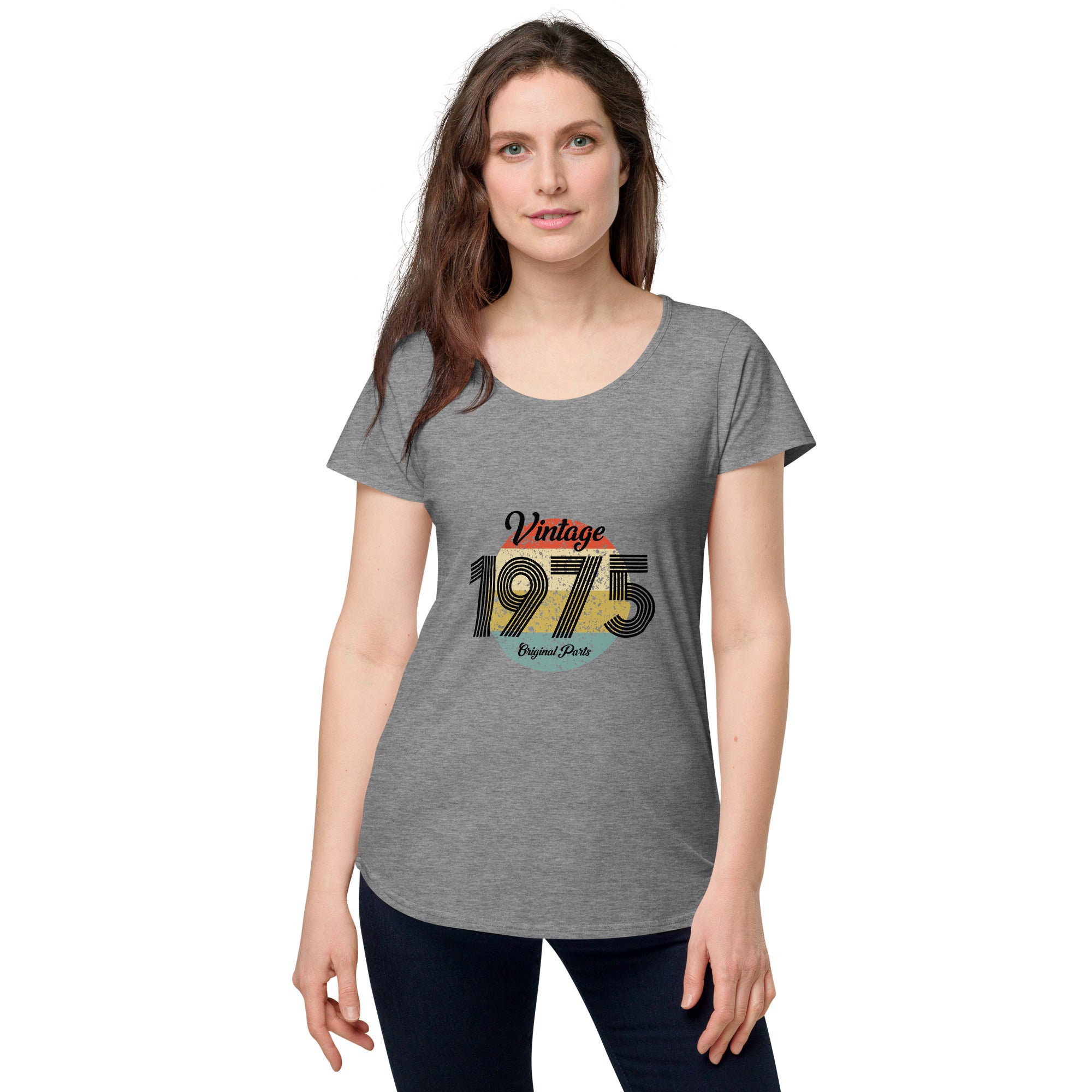 A woman wearing a grey women's t-shirt with 'Vintage 1975' printed on the front.