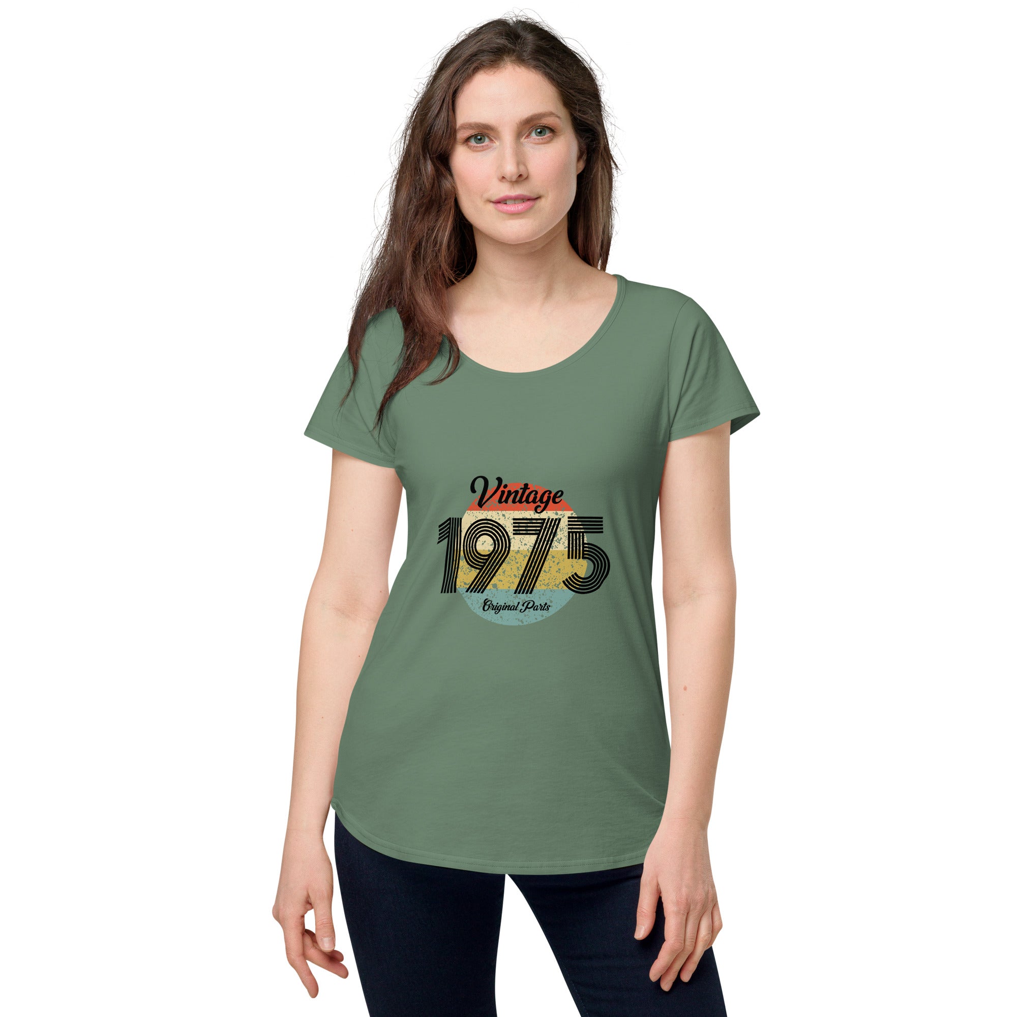 A woman wearing a green women's t-shirt with 'Vintage 1975' printed on the front.