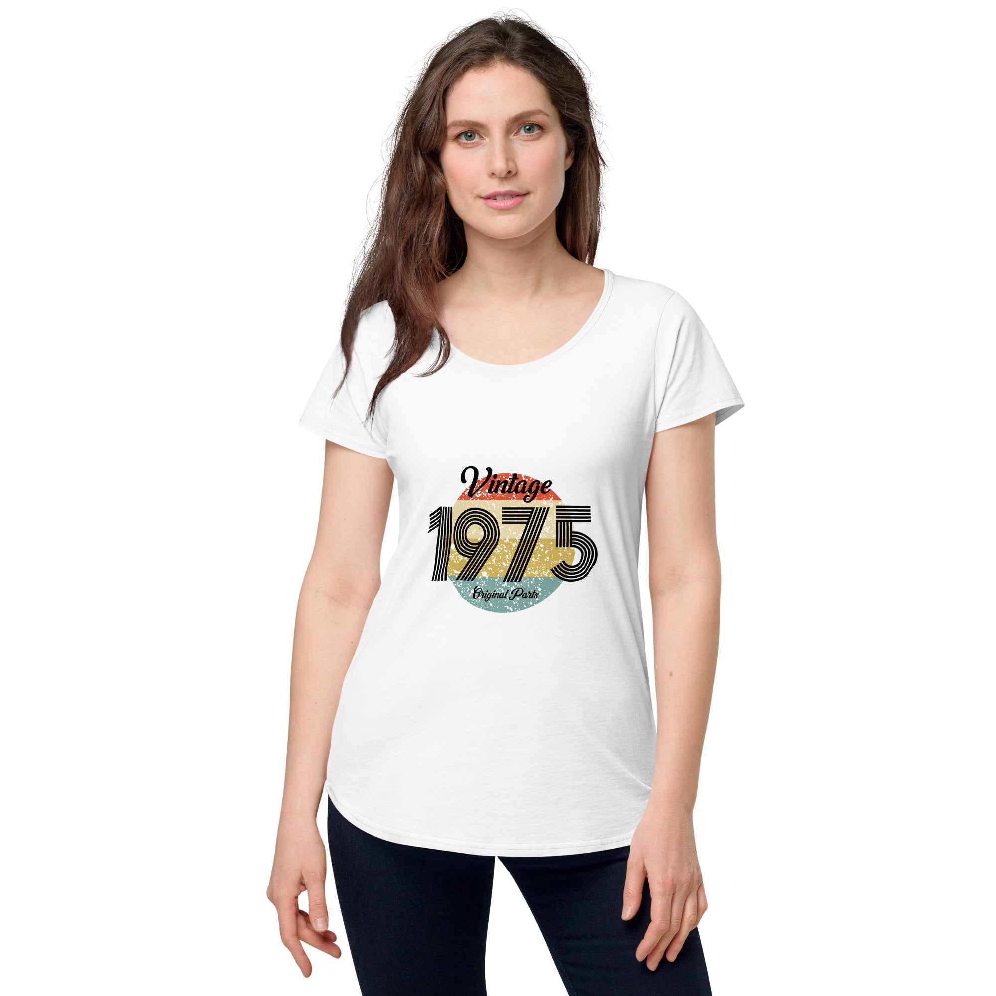 A woman wearing a white women's t-shirt with 'Vintage 1975' printed on the front.