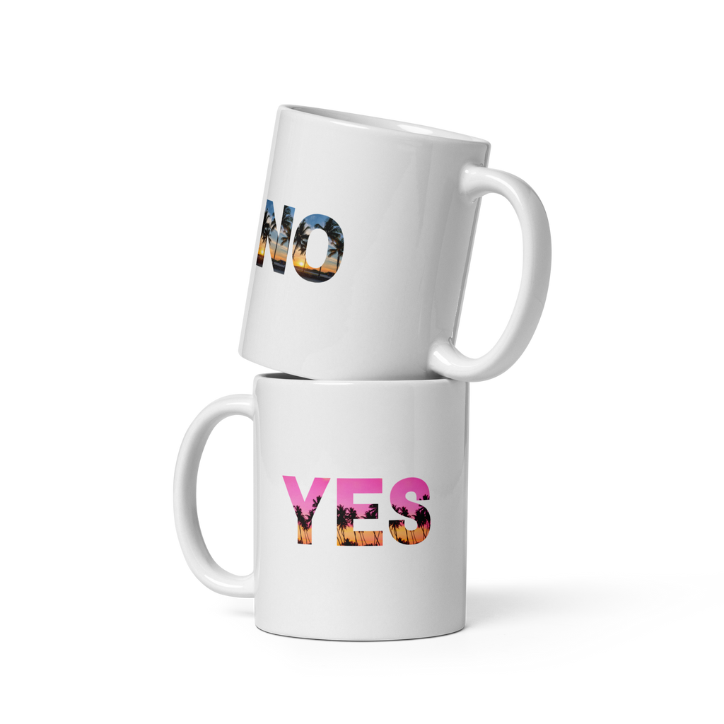 Two white mugs stacked on top of each other with colorful text on a white background