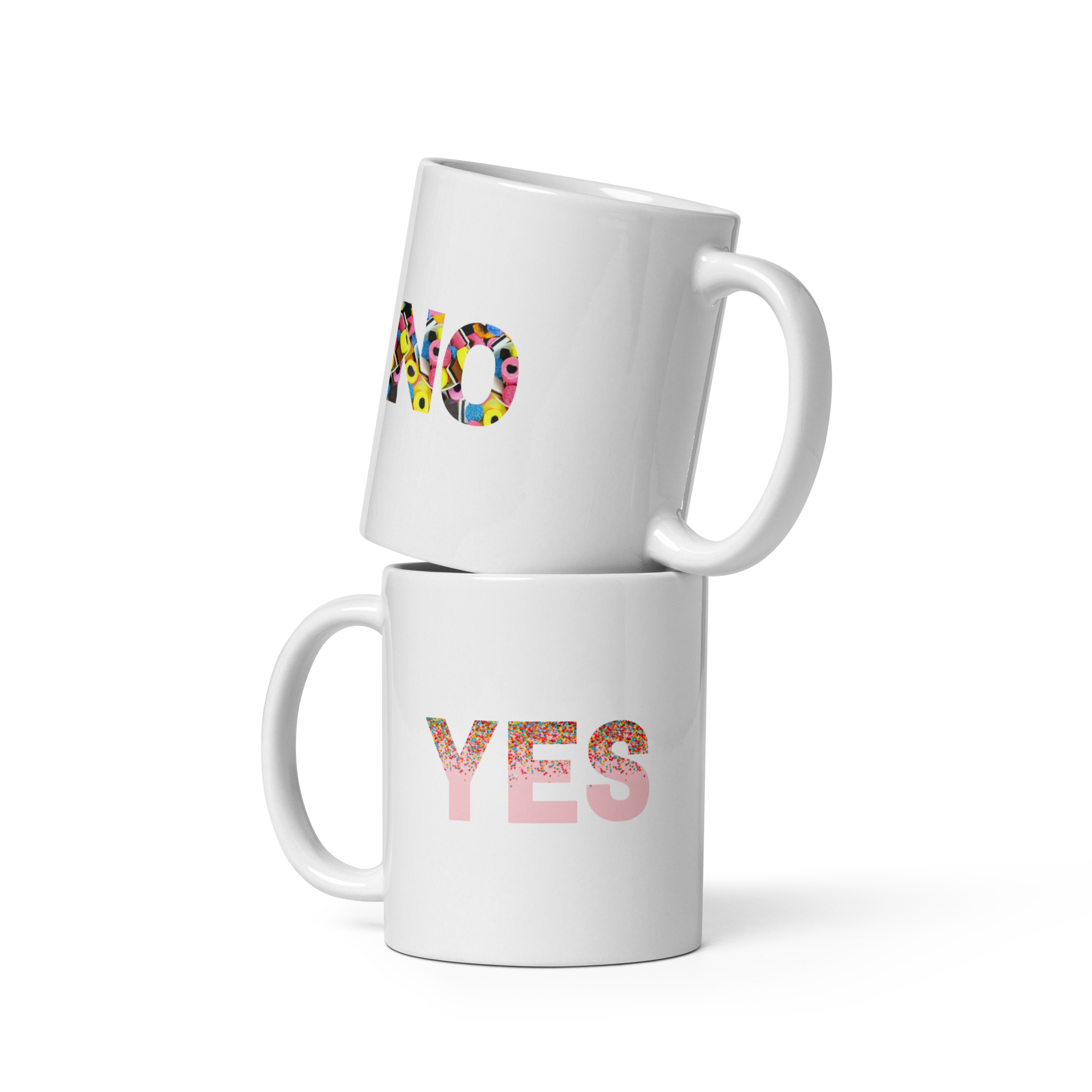 Two white mugs with 'NO' and 'YES' text on a white background